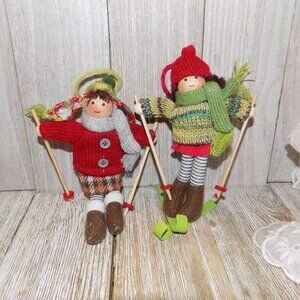 SKIER BOY AND GIRL ORNAMENTS HOME DECOR WINTER DECOR Girl Missing Skis